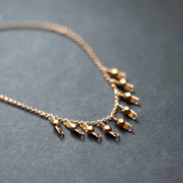 Drop Necklace in Gold + Brass